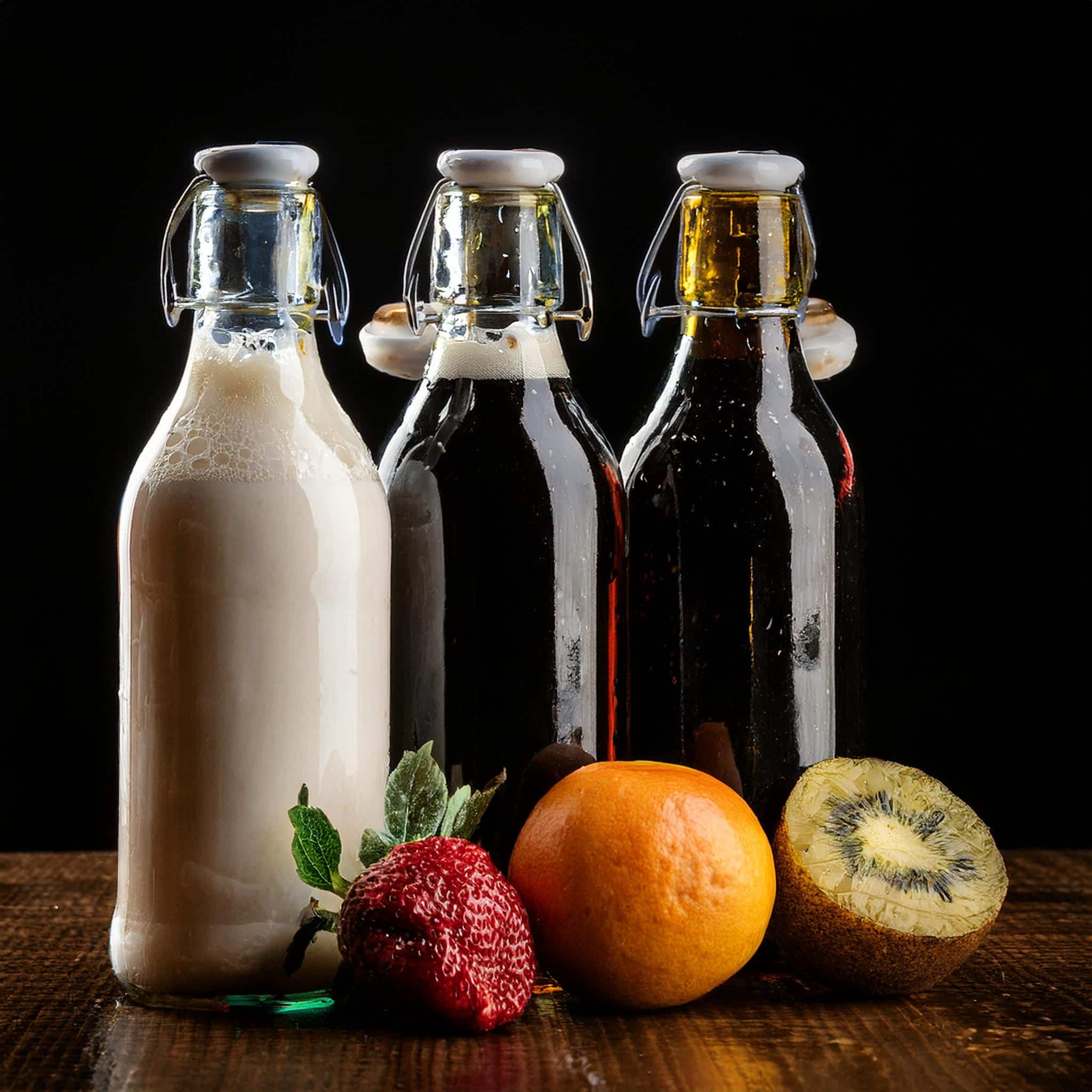 Bottles of milk, fruit, beer and wine